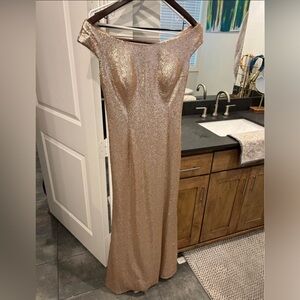 Rose gold off the shoulder gown.